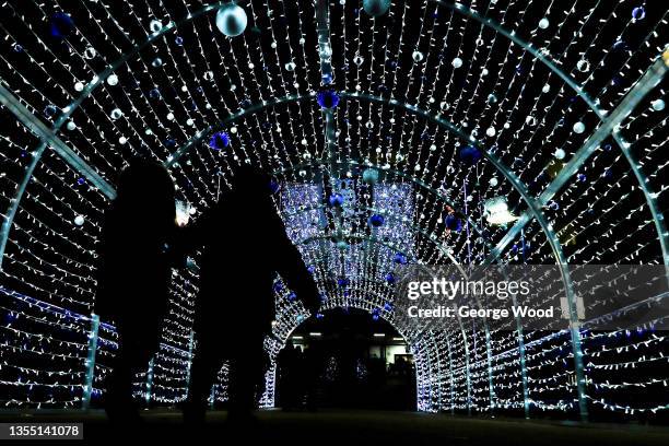 Fans arrive at the stadium through the Christmas lights archway prior to the Sky Bet League One match between Sheffield Wednesday and Milton Keynes...