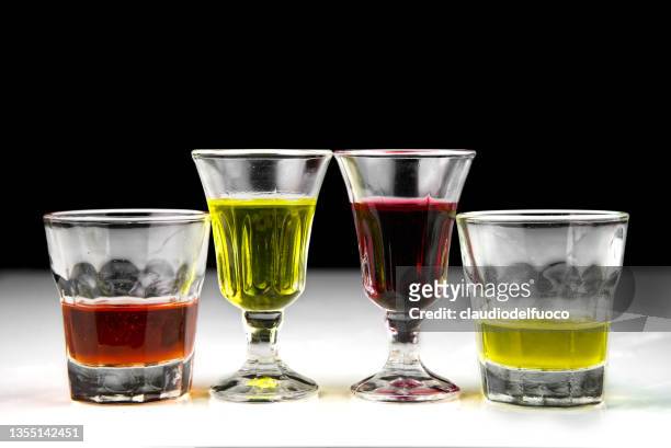 multicolored liqueur shot glasses - liqueur - fotografias e filmes do acervo