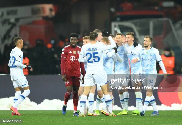 Denys Garmash of FC Dynamo Kyiv celebrates after scoring their side's first goal with team mates during the UEFA Champions League group E match...