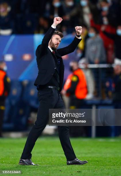 Michael Carrick, Interim Manager of Manchester United celebrates their side's victory after the UEFA Champions League group F match between...
