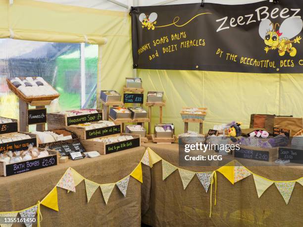 Stall selling honey based product, Bude Farmers and Craft Market, Bude, Cornwall, UK.