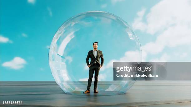 man is alone and isolated in his own bubble outside - confinement 個照片及圖片檔