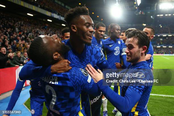 Callum Hudson-Odoi of Chelsea celebrates with Antonio Ruediger and Ben Chilwell after scoring their side's third goal during the UEFA Champions...