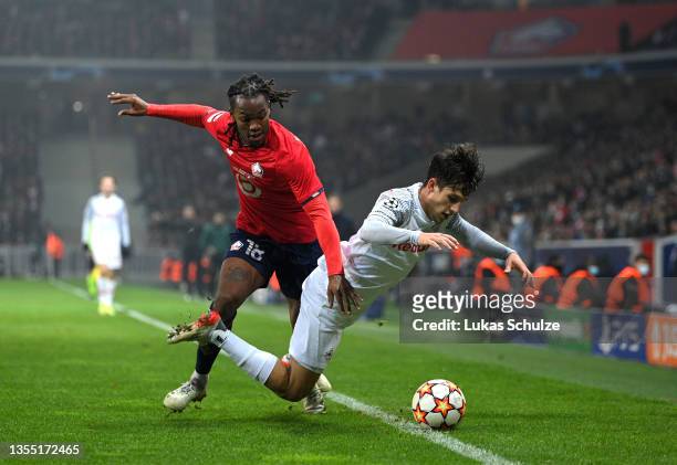 Renato Sanches of Lille OSC tackles Nicolas Capaldo of FC Salzburg during the UEFA Champions League group G match between Lille OSC and RB Salzburg...