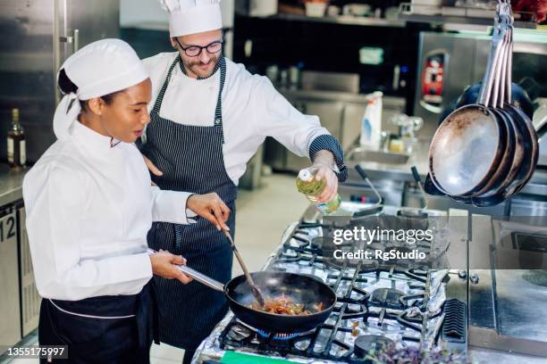 Cooking Staff Restaurant Kitchen Staff Photos and Premium High Res Pictures - Getty ...