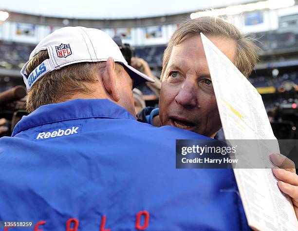 Head coach Norv Turner of the San Diego Chargers talk with Head coach Chan Gailey of the Buffalo Bills after the game at Qualcomm Stadium on December...