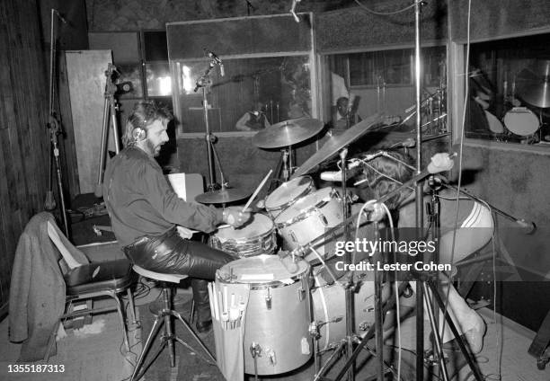 English musician, singer, songwriter and actor Ringo Starr sits behind the drum kit during a recording session circa 1985 in Los Angeles, California.