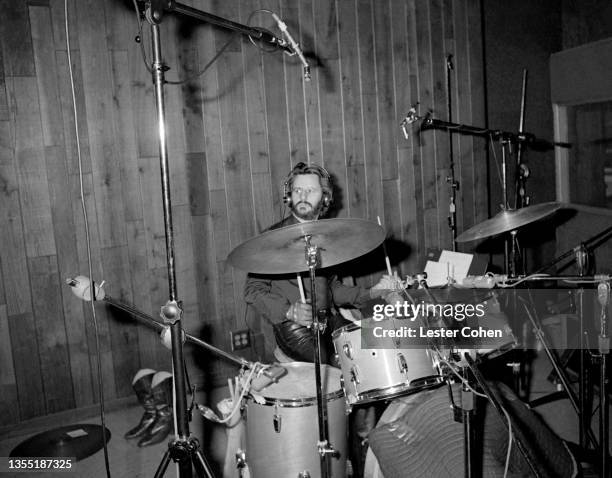 English musician, singer, songwriter and actor Ringo Starr sits behind the drum kit during a recording session circa 1985 in Los Angeles, California.