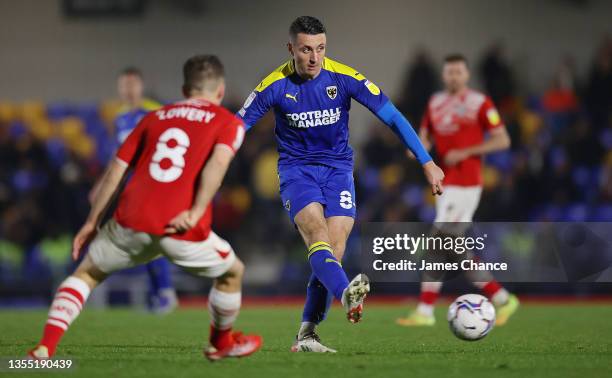 Anthony Hartigan of AFC Wimbledon passes the ball during the Sky Bet League One match between AFC Wimbledon and Crewe Alexandra at Plough Lane on...