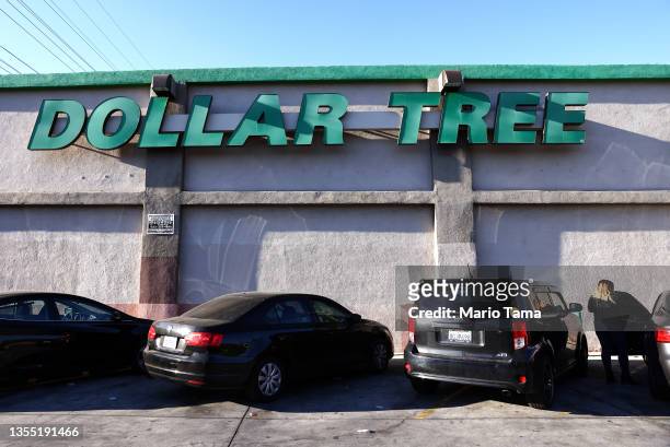 Shopper prepares to enter a Dollar Tree store on November 23, 2021 in Los Angeles, California. The company announced it will permanently increase...