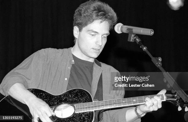 American adult contemporary and pop rock singer and songwriter Richard Marx plays his guitar on stage circa March, 1994 in Los Angeles, California.