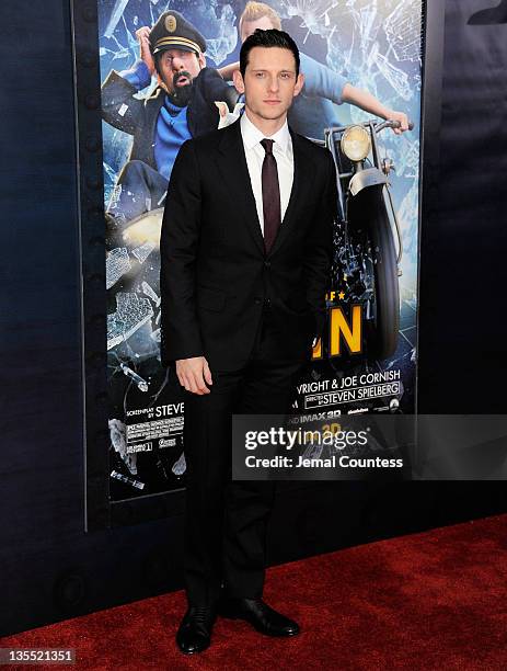 Actor Jamie Bell poses for a photo at the "The Adventures of TinTin" New York premiere at the Ziegfeld Theatre on December 11, 2011 in New York City.