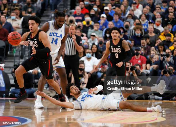 Andrew Nembhard of the Gonzaga Bulldogs steals the ball from Johnny Juzang of the UCLA Bruins during the championship game of the Good Sam Empire...