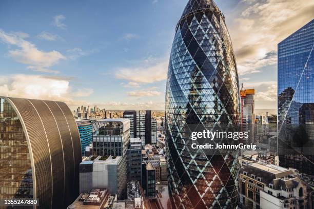 commercial skyscrapers in city of london - swiss re stock pictures, royalty-free photos & images