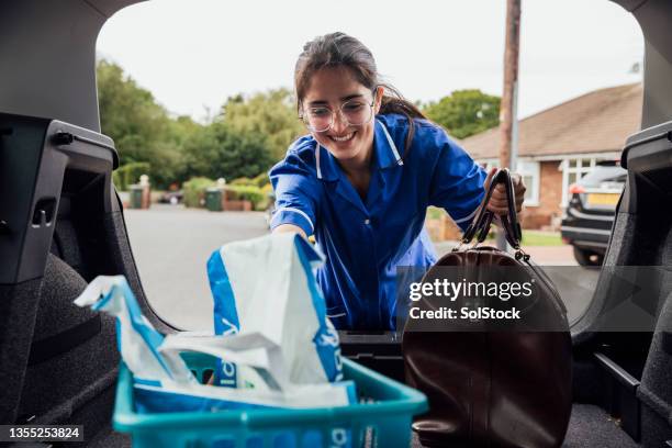 getting out her supplies - prescription home delivery stock pictures, royalty-free photos & images