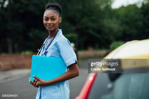 nurse starting her day - community service stock pictures, royalty-free photos & images