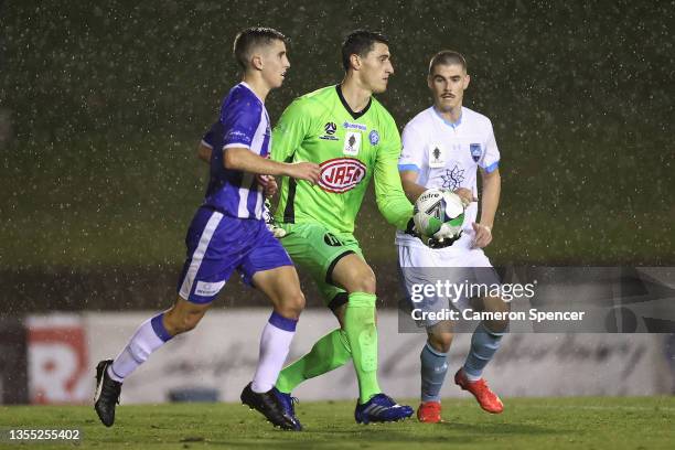 Nicholas Sorras of Olympic looks to kick during the FFA Cup round of 32 match between Sydney Olympic FC and Sydney FC at Belmore Sports Ground on...
