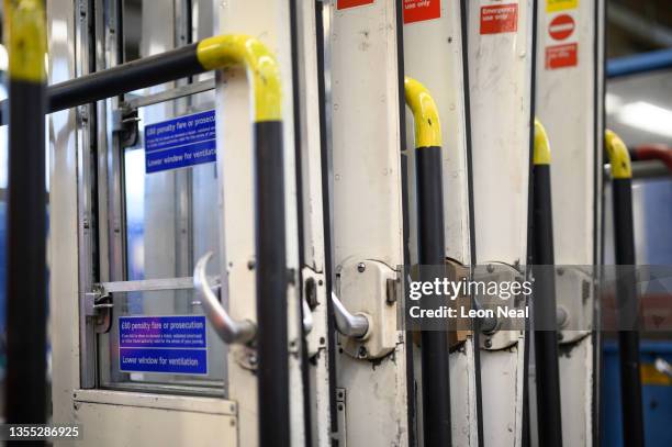 Row of doors from Bakerloo Line carriages are seen in the workshop area at Stonebridge Park Depot on November 24, 2021 in London, England. The...