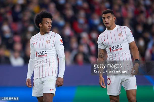 Jules Kounde and Diego Carlos of Sevilla FC look on during the UEFA Champions League group G match between Sevilla FC and VfL Wolfsburg at Estadio...