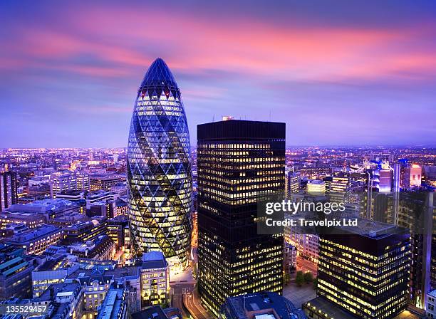 city at dusk - gherkin london stock pictures, royalty-free photos & images