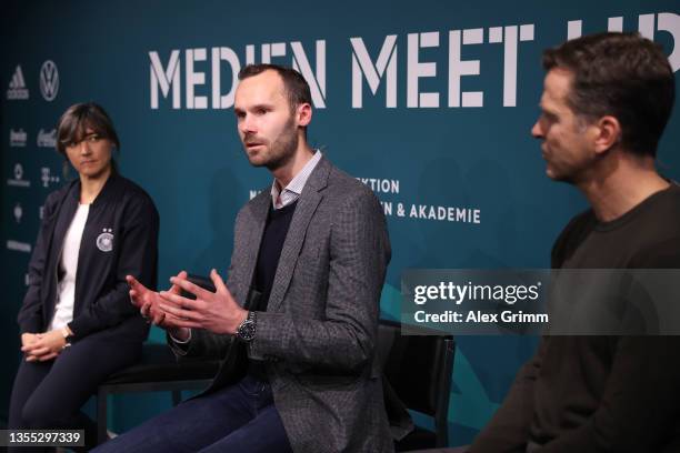 Sabine Loderer, head coach of the German U16 national women’s team, Tobias Haupt, head of the DFB Academy, and DFB Director Oliver Bierhoff talk to...