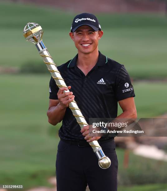 Collin Morikawa of the United States poses with The DP World Tour Championship trophy after winning The DP World Tour Championship at Jumeirah Golf...