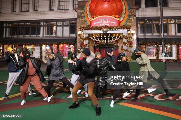 Jon Batiste performs during rehearsals for the Macy's Thanksgiving Day Parade at Macy's Herald Square on November 23, 2021 in New York City.