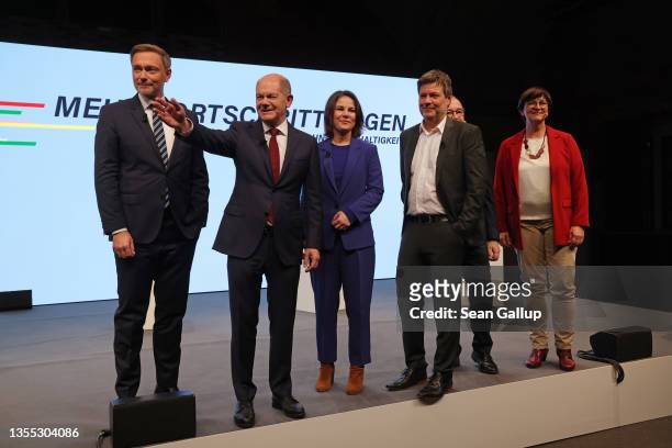 Christian Lindner of the German Free Democrats , Olaf Scholz of the German Social Democrats , Annalene Baerbock and Robert Habeck of the Greens Party...