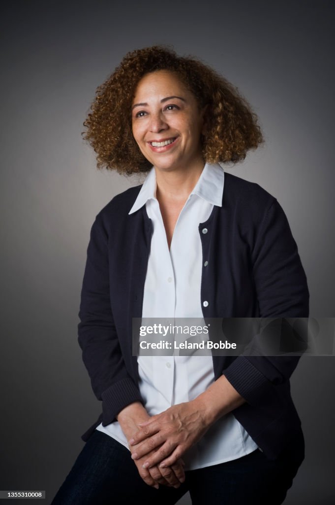 Studio Portrait of Middle Aged Mixed Race Woman