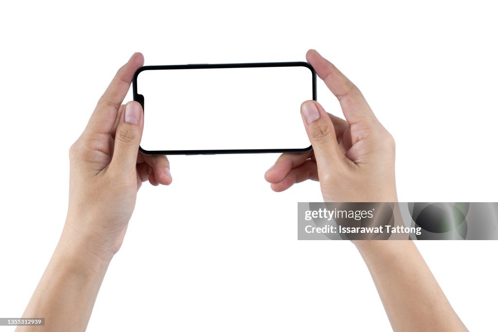 Smartphone in female hands taking photo isolated on white blackground