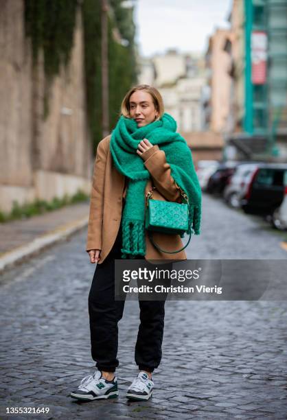 Sonia Lyson is seen wearing green scarf Dorothee Schumacher, Louis News  Photo - Getty Images