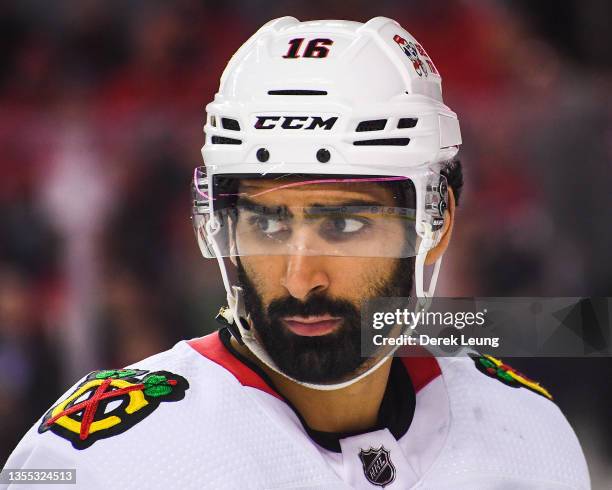 Jujhar Khaira of the Chicago Blackhawks in action against the Calgary Flames during an NHL game at Scotiabank Saddledome on November 23, 2021 in...
