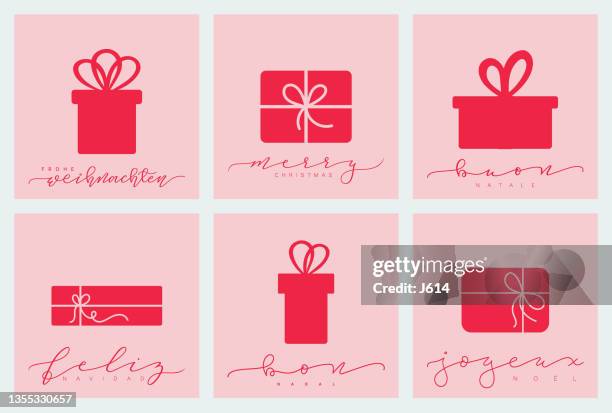 ilustraciones, imágenes clip art, dibujos animados e iconos de stock de juego de tarjetas de felicitación de navidad multilingüe - regalo