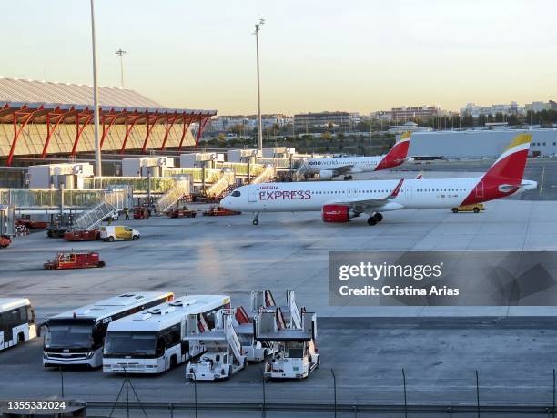 Iberia Express airplane in the landing strips in the Adolfo Suarez Madrid-Barajas Airport on november 10, 2021 in Madrid, Spain.