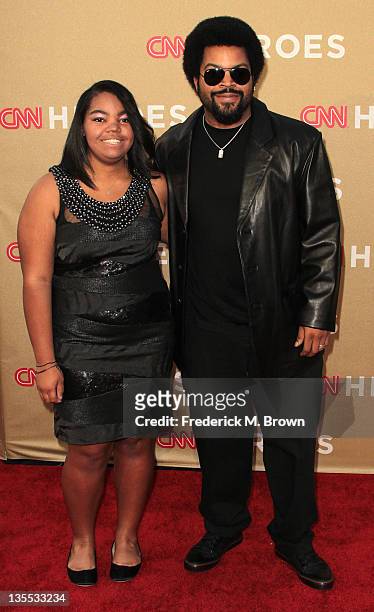 Recording artist Ice Cube and his daughter attend the CNN Heroes: An All-Star Tribute at The Shrine Auditorium on December 11, 2011 in Los Angeles,...