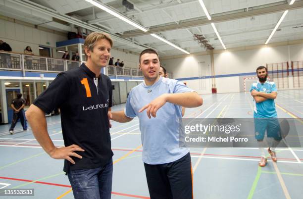 Edwin van der Sar meets a player after the Laureus Midnight Cup final on December 11, 2011 in The Hague, Netherlands.