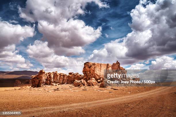 panoramic view of desert against sky,desierto de atacama,antofagasta,chile - antofagasta stockfoto's en -beelden