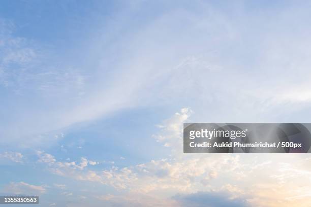 low angle view of sky during sunset - aukid stock-fotos und bilder