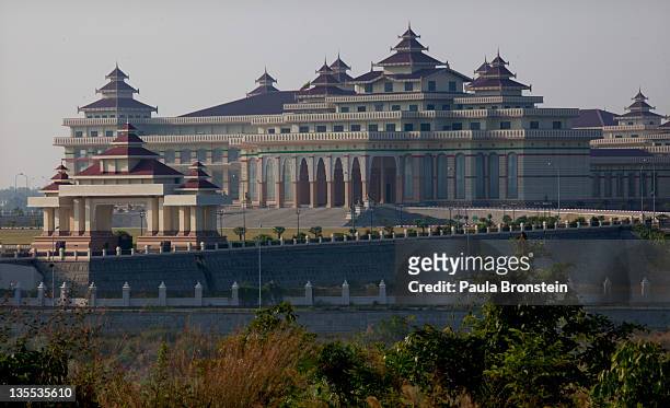 The massive Parliament building is seen surrounded by high gates and wide 10 lane roads December 5, 2011 in Nay Pyi Taw, Myanmar. NayPyiTaw is the...