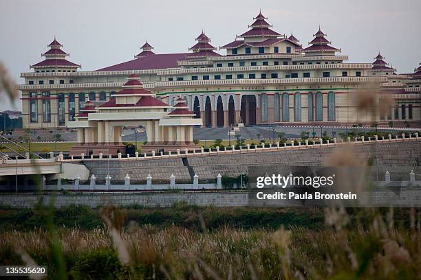 The massive Parliament building is seen surrounded by high gates and wide 10 lane roads December 5, 2011 in Nay Pyi Taw, Myanmar. NayPyiTaw is the...