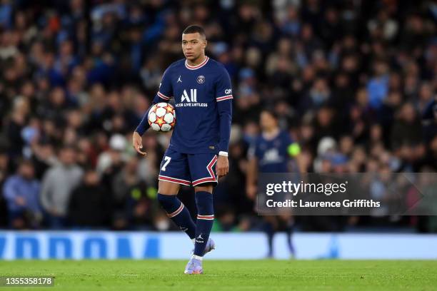 Kylian Mbappe of Paris Saint-Germain reacts as he holds the ball after Manchester City's first goal during the UEFA Champions League group A match...