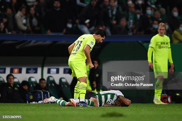 Matheus Nunes of Sporting CP reacts as he appears to be injured during the UEFA Champions League group C match between Sporting CP and Borussia...