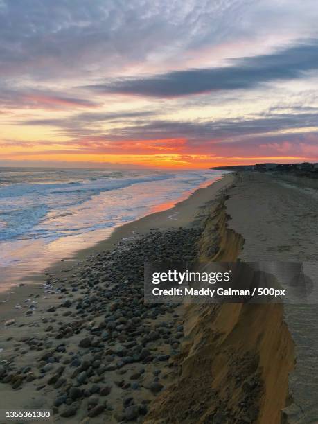 scenic view of beach against sky during sunset,montauk,new york,united states,usa - maddy gaiman stock pictures, royalty-free photos & images