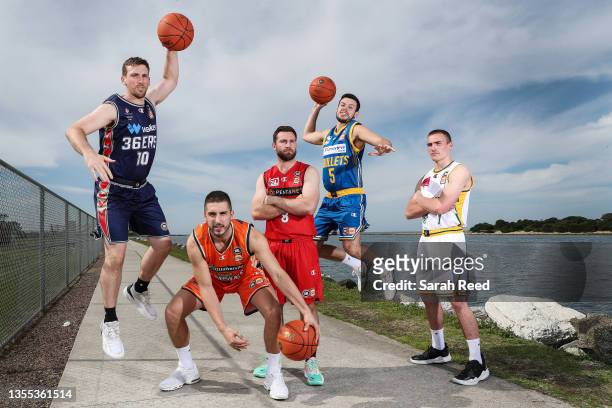 Mitch McCarron of the Adelaide 36ers, Mirko Djeric of the Cairns Taipans, Mitch Norton of the Perth Wildcats, Jason Cadee of the Brisbane Bullets and...
