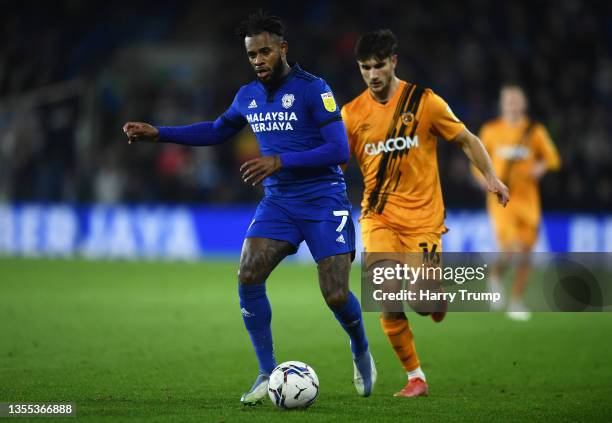 Leandro Bacuna of Cardiff City is tackled by Ryan Longman of Hull City during the Sky Bet Championship match between Cardiff City and Hull City at...