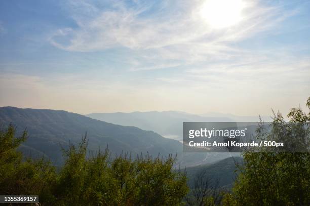 scenic view of mountains against sky - amol stock pictures, royalty-free photos & images