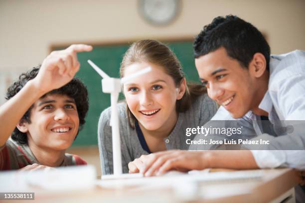 teenage students studying wind power - science curiosity stock pictures, royalty-free photos & images