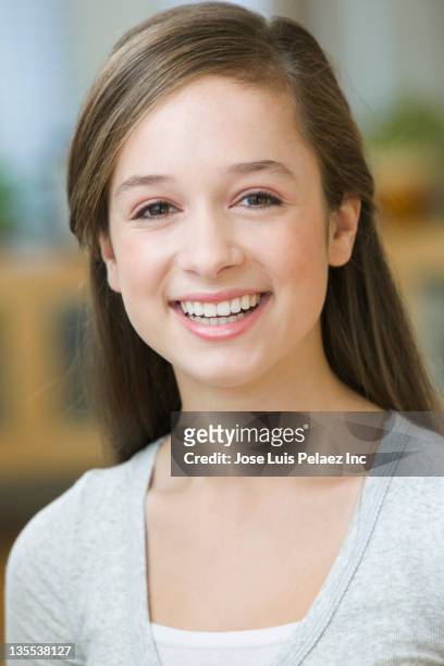smiling caucasian teenage girl - 14 year old brunette girl stock pictures, royalty-free photos & images