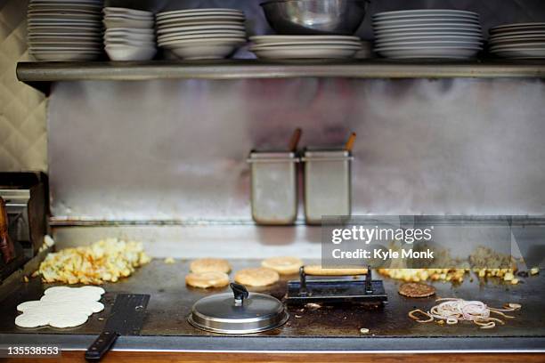 breakfast cooking on diner griddle - griddle stock pictures, royalty-free photos & images