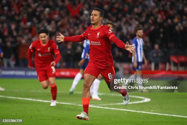 Thiago Alcantara of Liverpool celebrates scoring the opening goal during the UEFA Champions League group B match between Liverpool FC and FC Porto at...